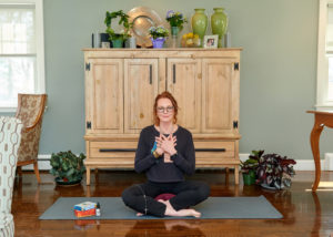 Women meditating while sitting on the floor